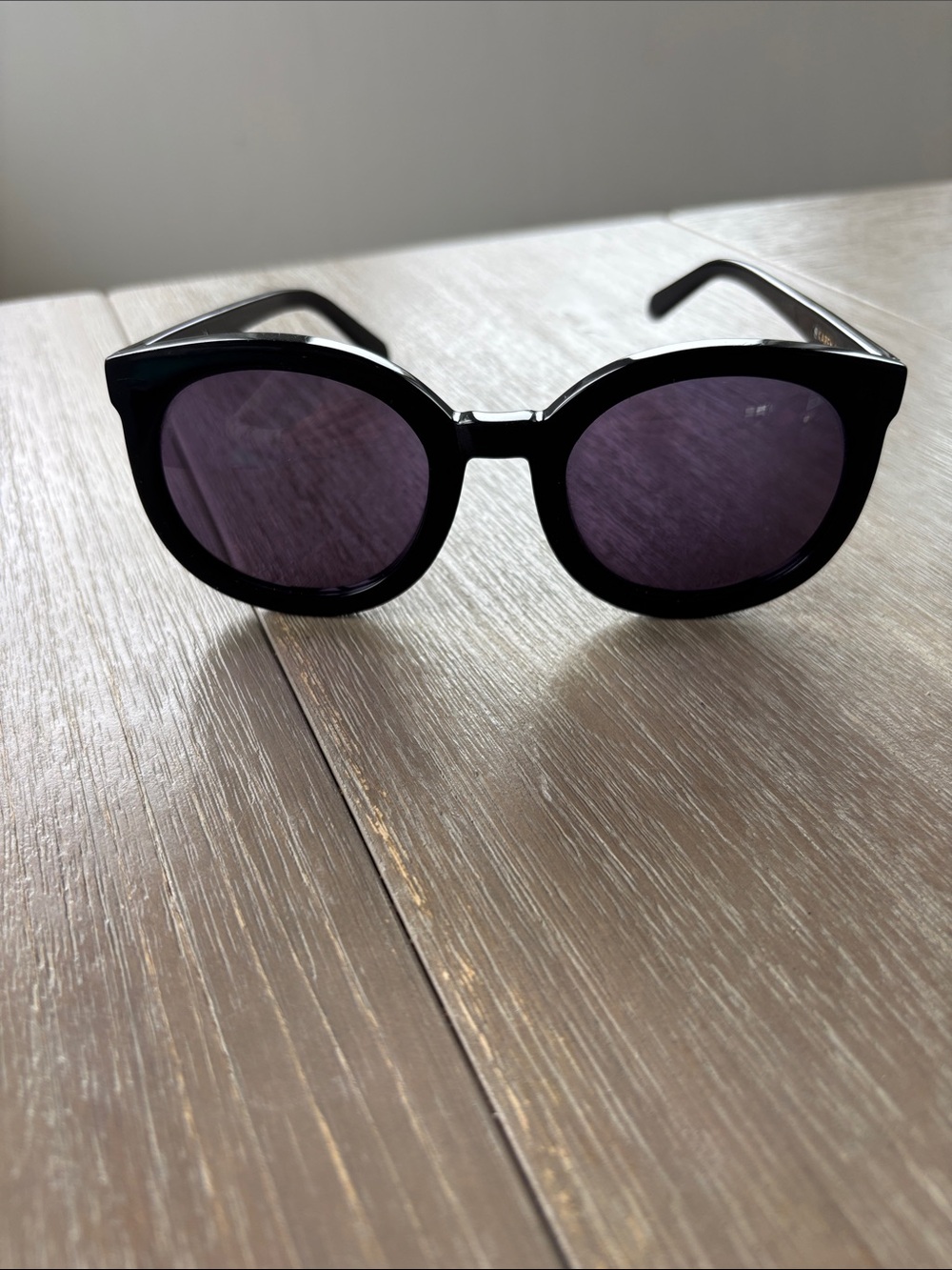 Karen Walker Black Round Sunglasses with Dark Lenses